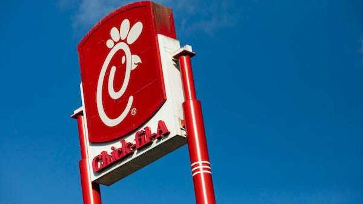 A logo sign outside of a Chick-fil-A restaurant location in Martinsburg, West Virginia