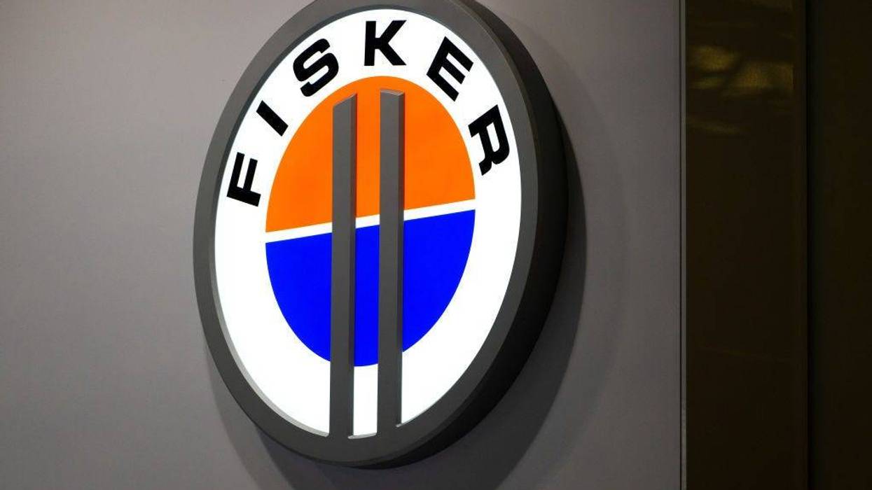 A logo sits illuminated outside the Fisker booth at the SK telecom booth on day 1 of the GSMA Mobile World Congress on February 28, 2022 in Barcelona, Spain.