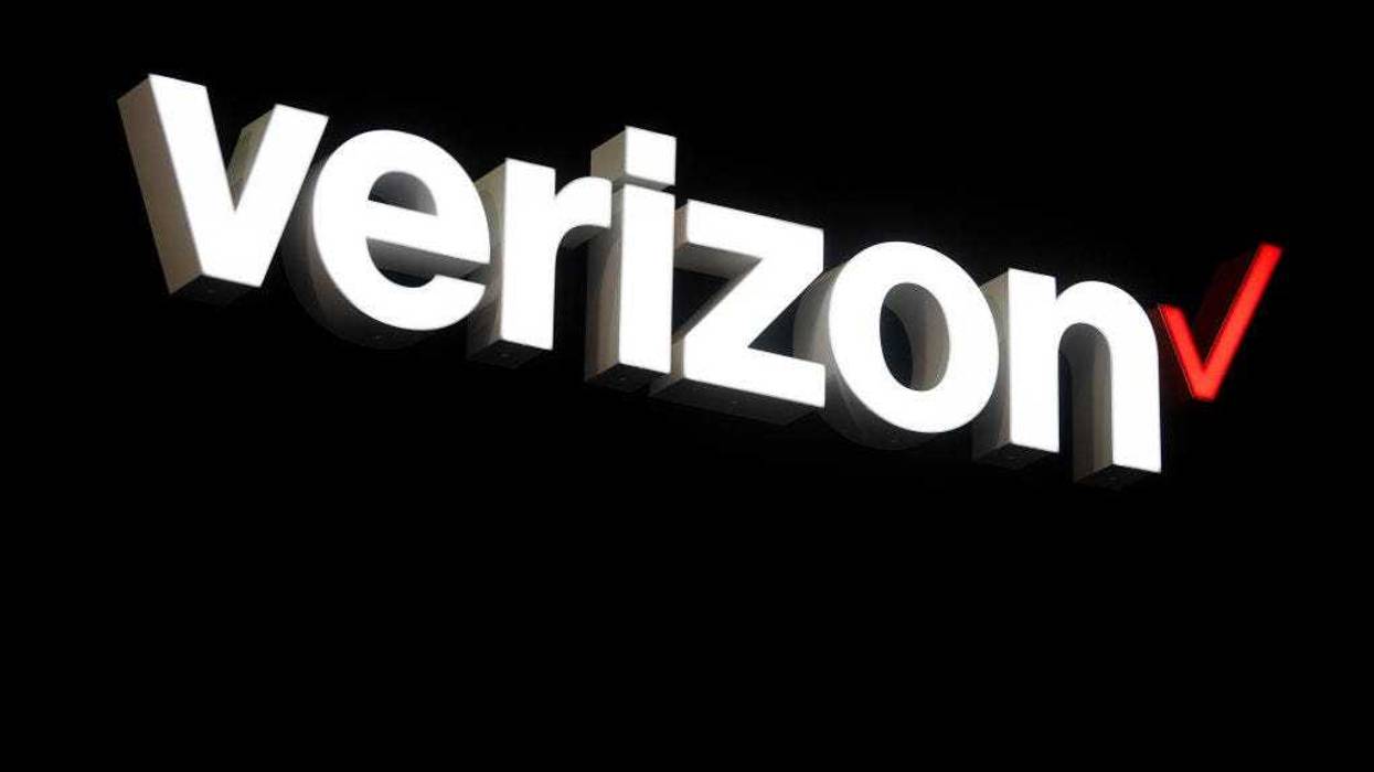 A logo sits illumintated outside the Verizon booth on day 2 of the GSMA Mobile World Congress 2019 on February 26, 2019 in Barcelona, Spain.