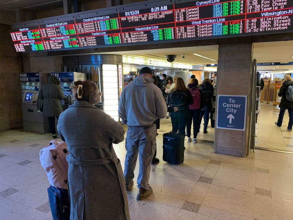 A long line forms outside the sole Dunkin