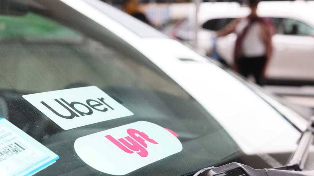 A Lyft decal is seen on a car in the pick-up area at JFK Airport on April 28, 2023 in New York City.