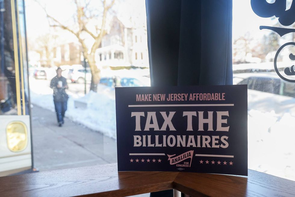 A "Make New Jersey Affordable Tax The Billionaires" sign in Montclair.