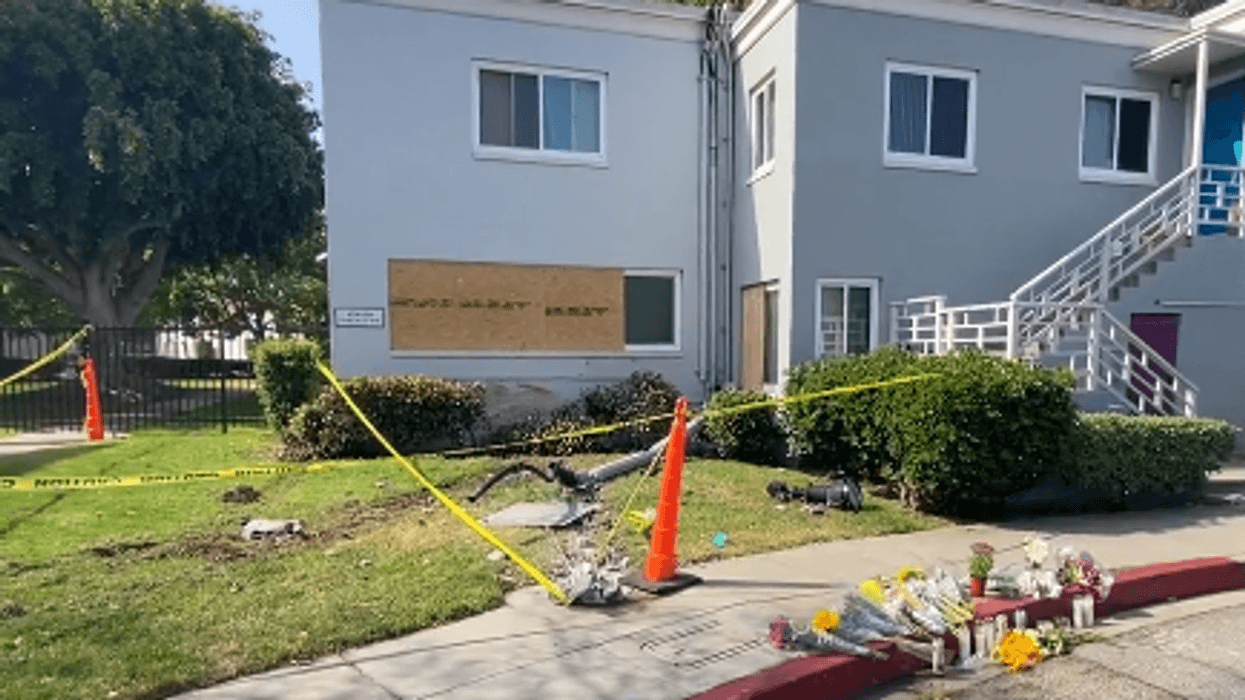 A makeshift memorial near Hancock Park Elementary, where a woman and a child were hit by a speeding pickup truck on Tuesday.