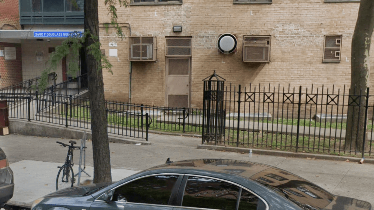 A man and bystander were shot at a Harlem NYCHA complex on Monday afternoon.