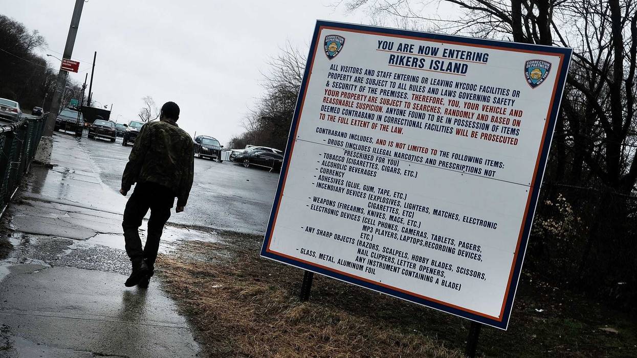 A man enters the road to Rikers Island on March 31, 2017 in New York City.