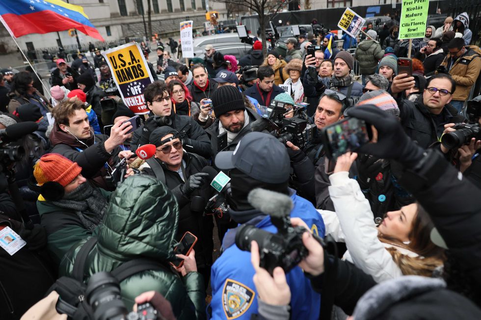 A man from Venezuela argues with people in support of President of Venezuela Nicolas Maduro outside of Daniel Patrick Moynihan United States Courthouse before Maduro