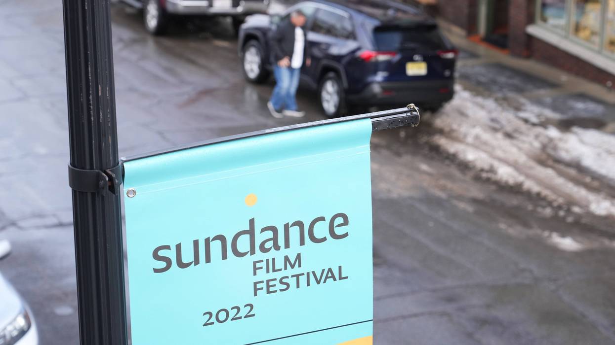 A man gets out of his car on Old Main Street where filmgoers would have gathered for the 2022 Sundance Film Festival on Jan. 6, 2022, in Park City Utah.