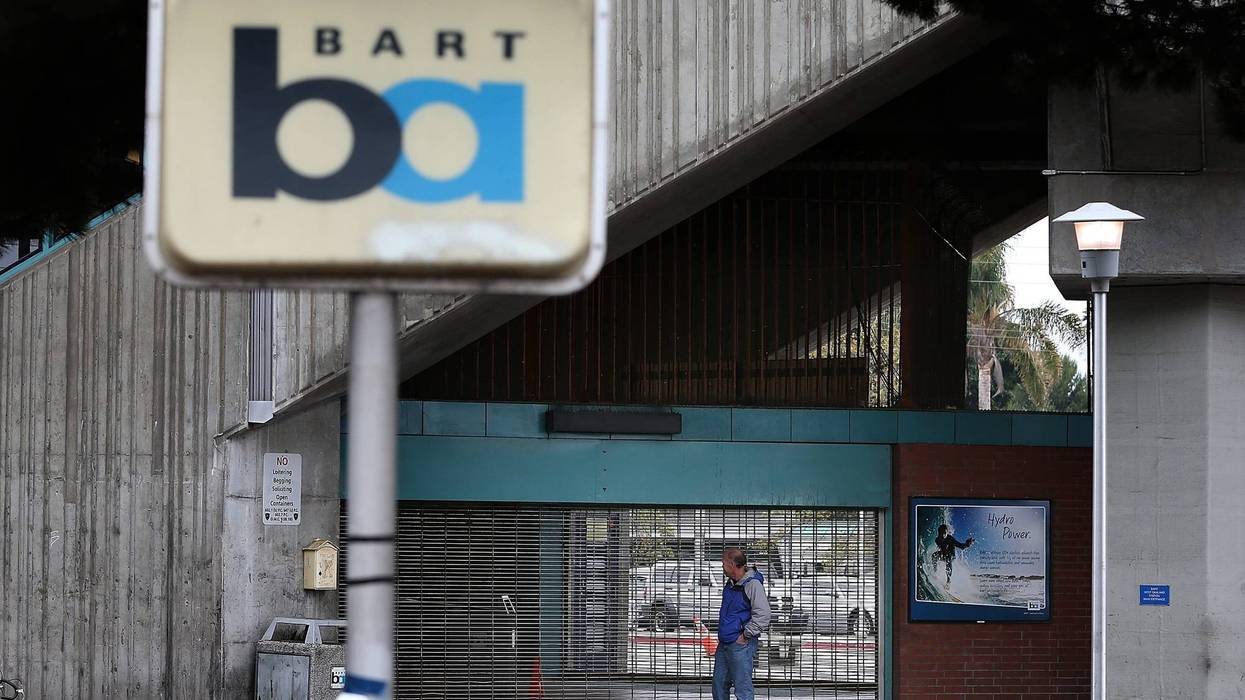 A man looks into the shuttered Bay Area Rapid Transit (BART) West Oakland station on October 21, 2013 in Oakland, California.