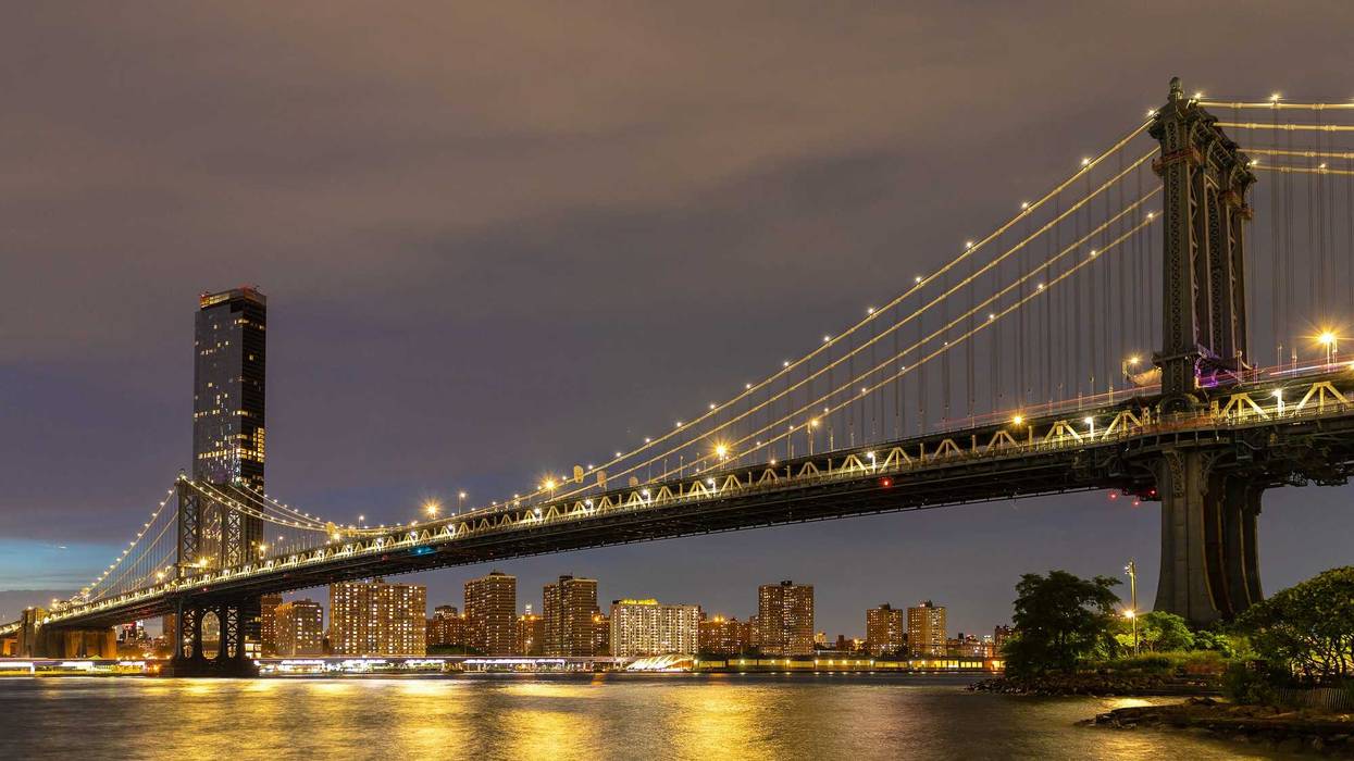 A man plunged to his death on the Manhattan side of the Manhattan Bridge on Tuesday morning as he tried to flee a car crash, police said