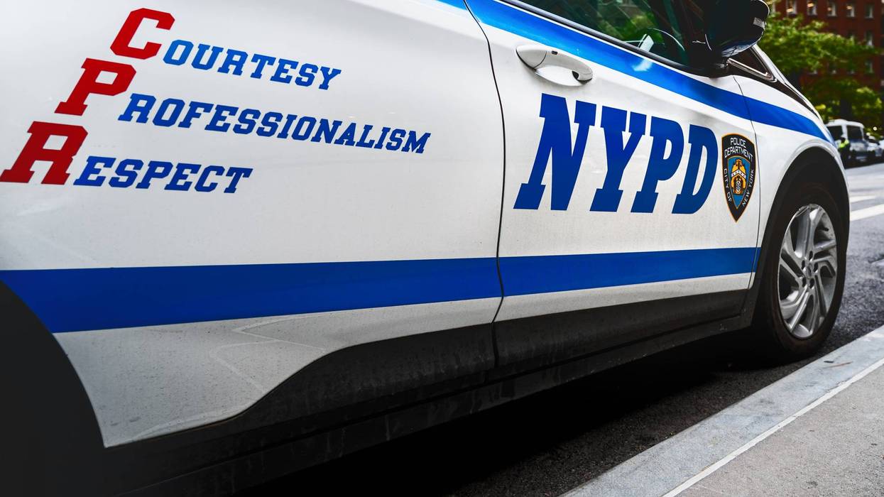 A man's decomposing body was discovered over the weekend with a knife sticking out of his neck in his Brooklyn apartment, police sources said.