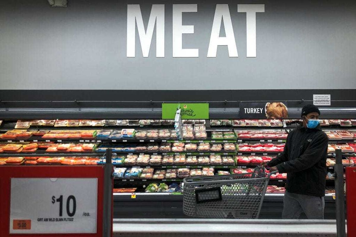 A man shops in the meat section at a grocery store, April 28, 2020 Washington, DC.