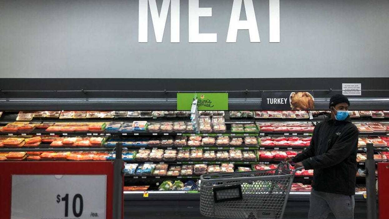 A man shops in the meat section at a grocery store, April 28, 2020 Washington, DC.