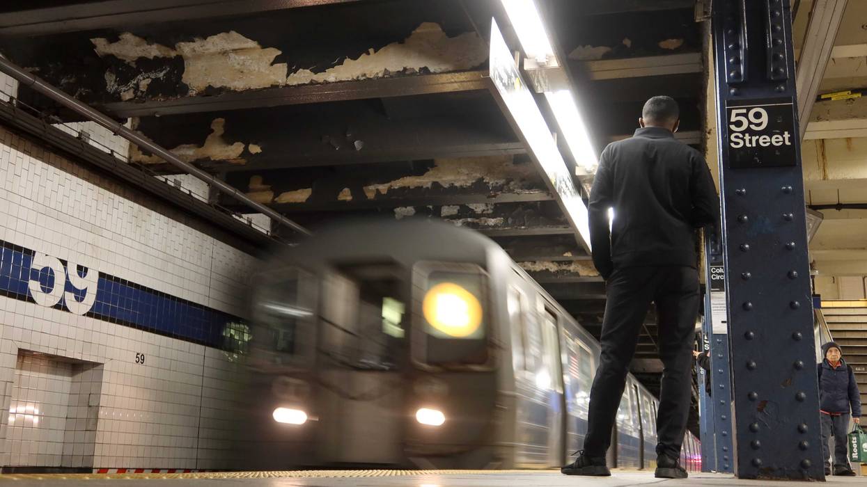 A man waits to board a subway train at the Columbus Circle - 59th Street station on March 27, 2023, in New York City