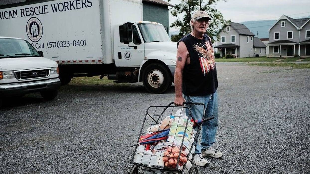A man walks away from a food pantry operated by the American Rescue Workers in the struggling city of Williamsport, which has recently seen an epidemic of opioid use among its population on July 13, 2017 in Williamsport, Pennsylvania.