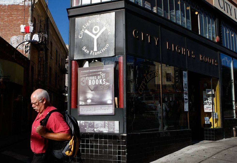 A man walks by the City Lights Bookstore October 3, 2007 in the North Beach neighborhood of San Francisco, California.