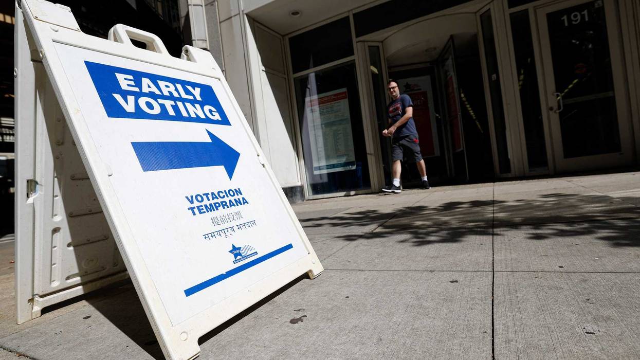A man walks out of the Chicago Board of Elections Loop Super Site after casting his ballot in the 2024 presidential election on Oct. 4, 2024.