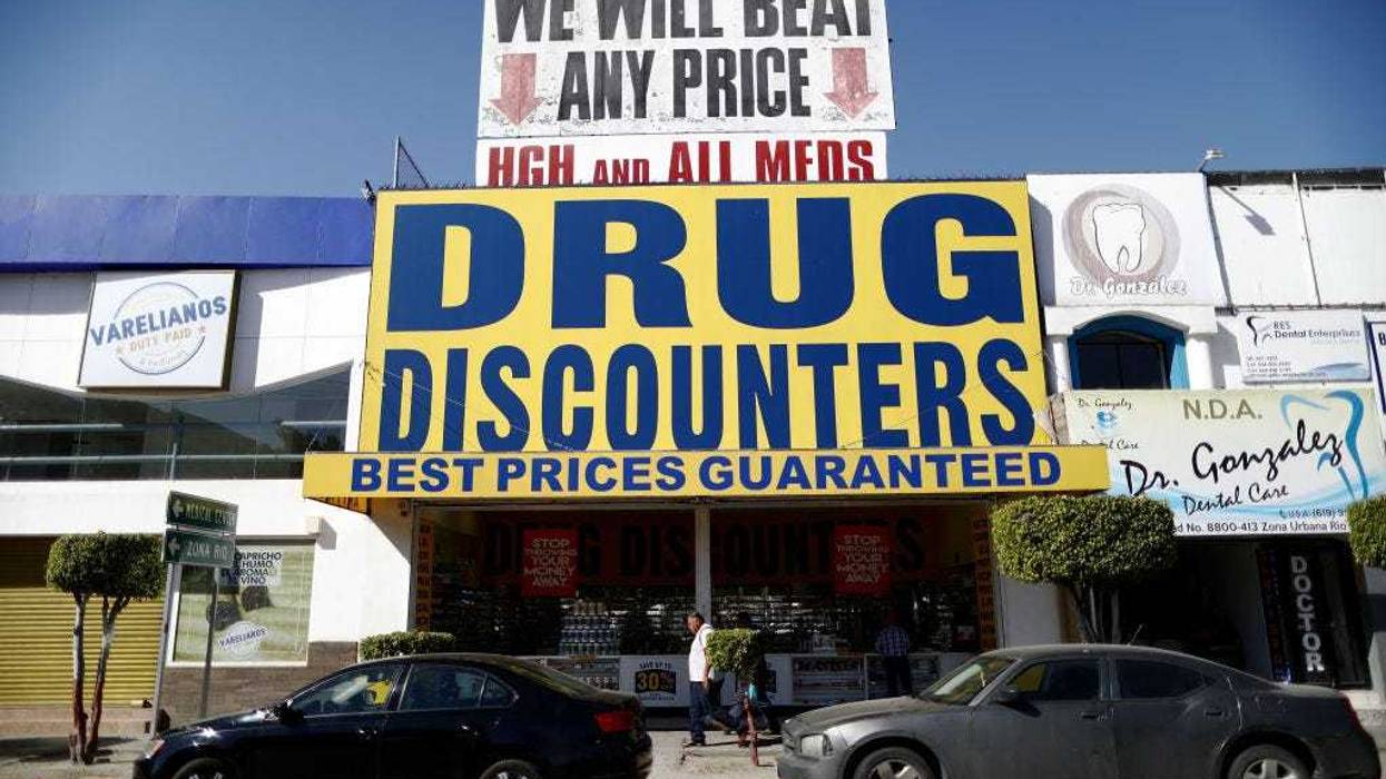 A man walks past a pharmacy on March 31, 2019 in Tijuana, Mexico. A worker at the pharmacy said around 40 percent of their customers come across the border from the United States. U.S. President Donald Trump told reporters Friday “there's a very good likelihood” that he will close the U.S. Southern border next week. (Photo by Mario Tama/Getty Images)