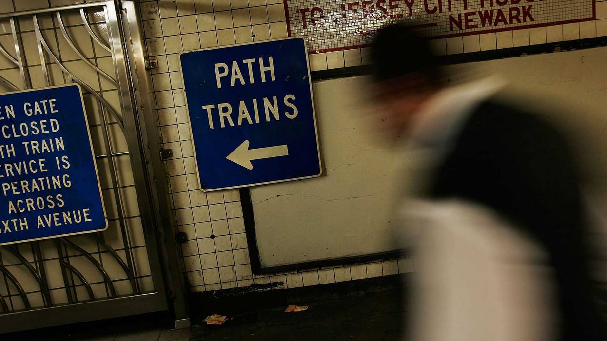 A man walks to the World Trade Center PATH train station platforms May 14, 2007 in New York City.
