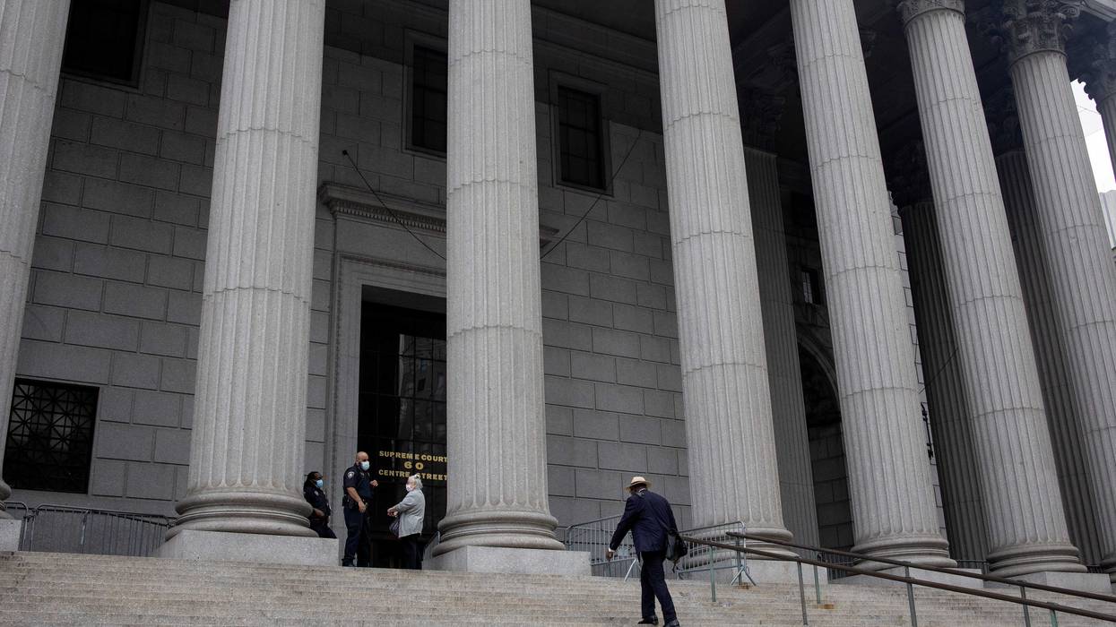 A man walks up the steps of the New York State Supreme Court on August 30, 2021 in downtown Manhattan, New York City.