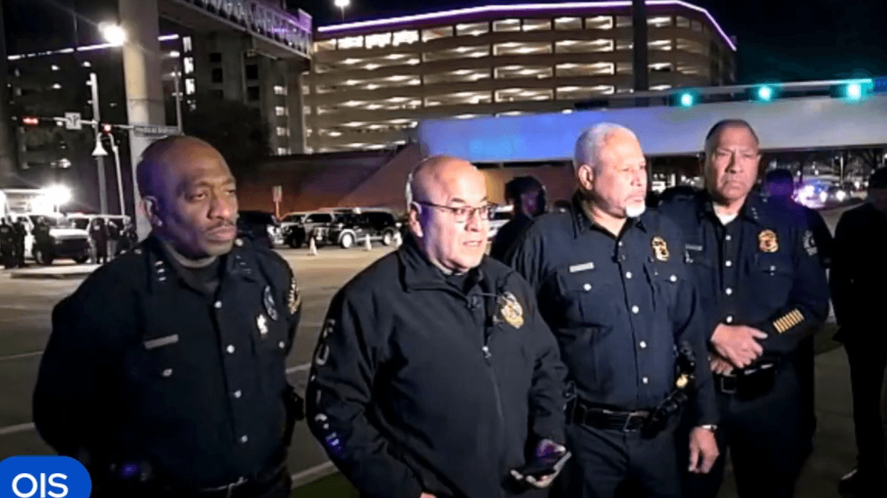 A man wanted on multiple felony warrants is dead after Dallas police officers shot him inside a parking garage at Children's Health Hospital late Wednesday night, following a tense barricade standoff that brought SWAT teams to the Medical District.