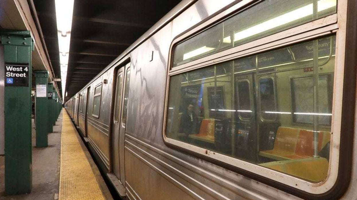 A man was arrested on Wednesday after cops said he slashed one officer and bit another inside the West 4th Street subway station in Manhattan.
