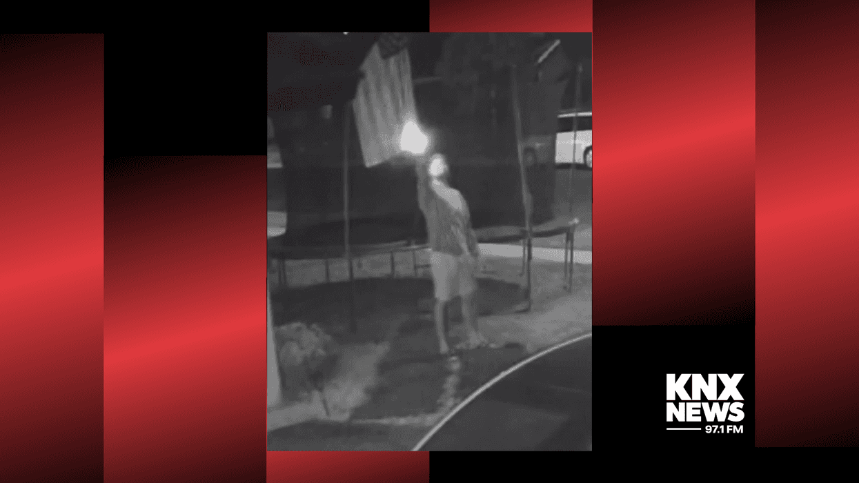 A man was caught on camera setting fire to an American flag outside the home of an Israeli family in West Hills on Saturday night.