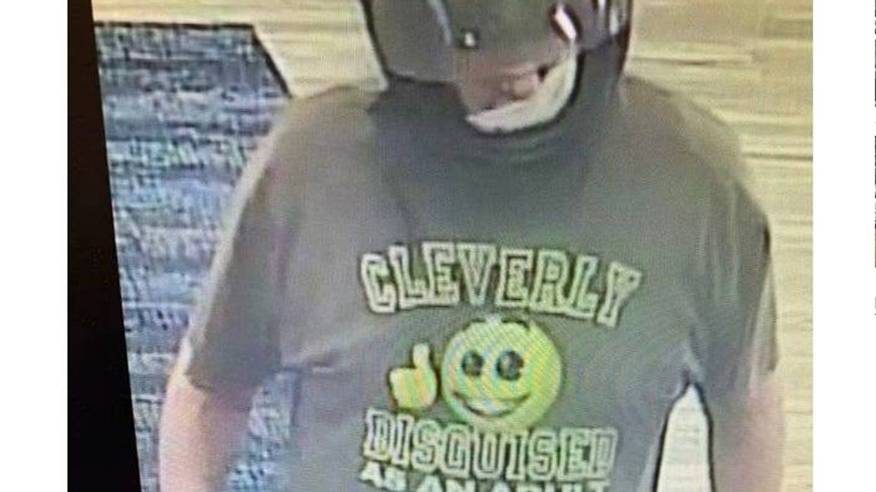 A man who allegedly robbed a bank in Southwest Michigan on Monday pulled off the act wearing some very recognizable clothing in photos released by authorities.