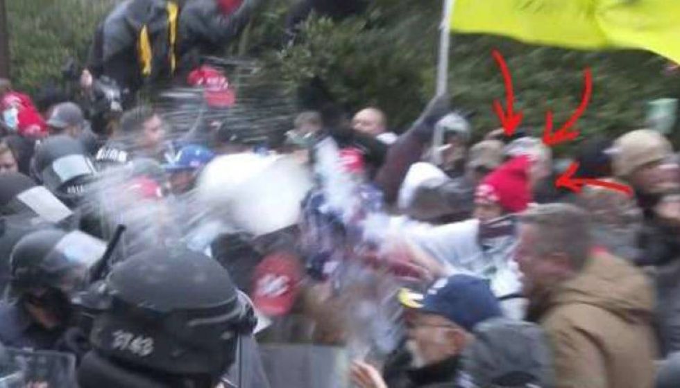 A man who prosecutors say is Michael Dickinson, from Philadelphia, who allegedly attacked law enforcement during the January 6 insurrection.
