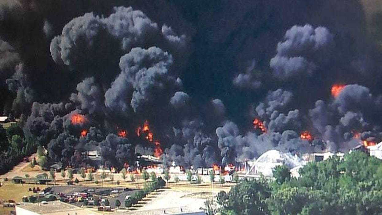 A massive chemical plant fire that sent black plumes of smoke into the air near the Illinois-Wisconsin border is expected to continue burning for several days as firefighters retreat and residents were ordered to evacuate.