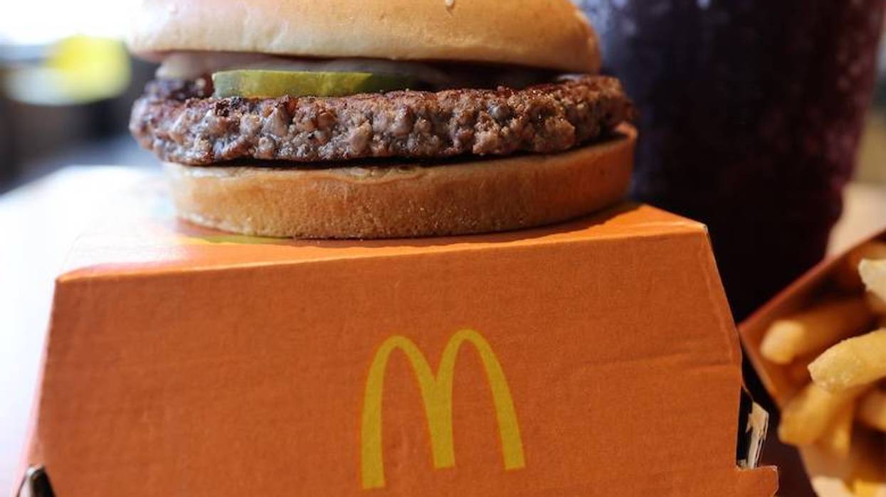 A McDonald's Quarter Pounder hamburger meal with fries and a drink