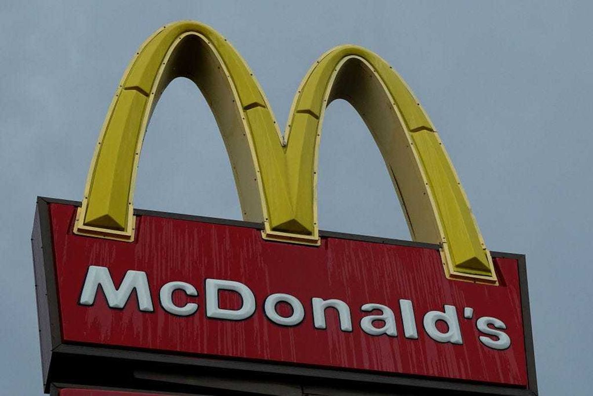 A McDonalds sign hangs outside the fast food restaurant on July 26, 2022 in Miami, Florida.
