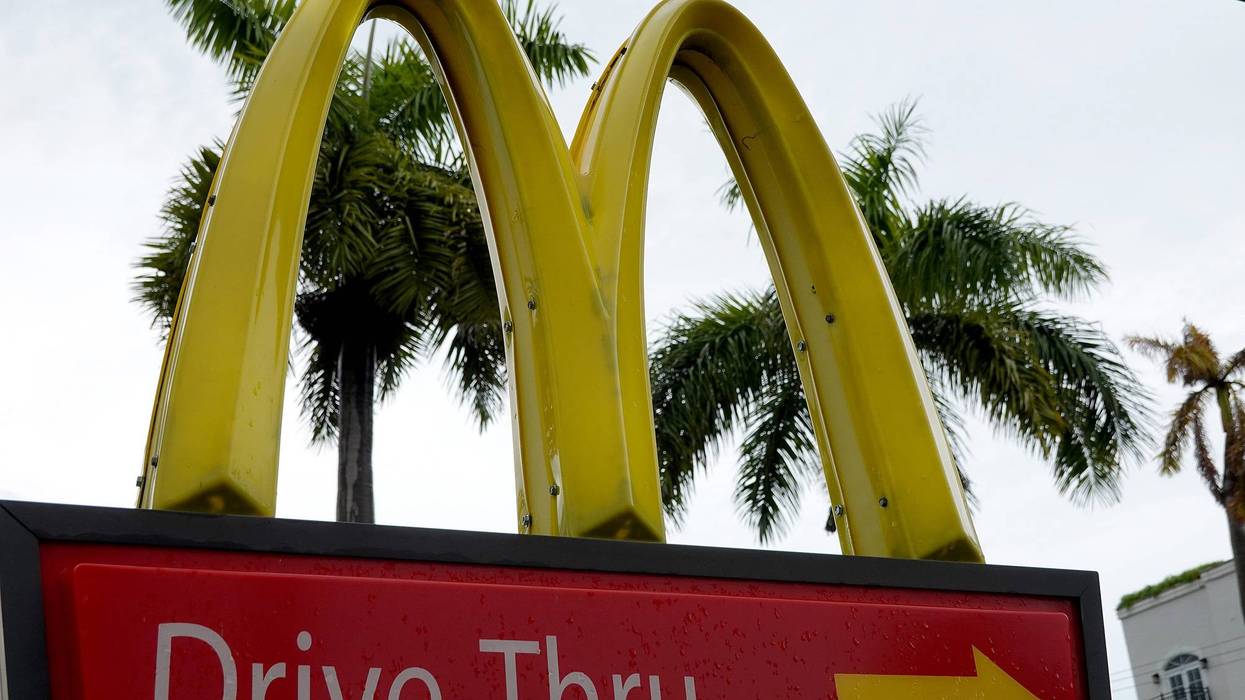A McDonalds sign hangs outside the fast food restaurant on July 26, 2022 in Miami, Florida.