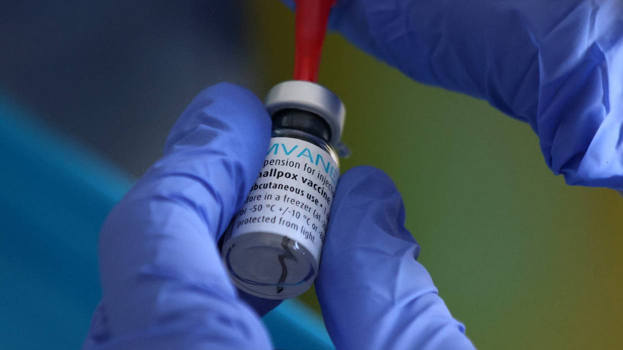 A medical professional prepares a dose of the monkeypox vaccine. Monkeypox, a rare disease, is part of the same family of viruses as smallpox.