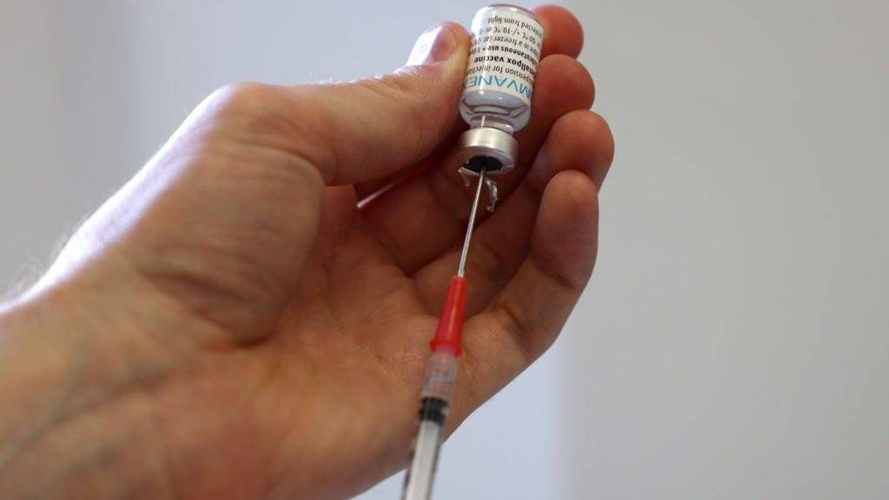 A medical professional prepares a dose of the monkeypox vaccine on July 23, 2022 in London, England.