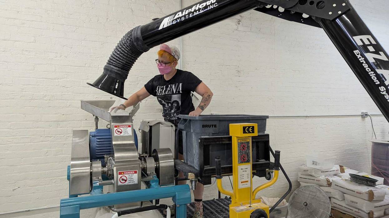 A Meliora Cleaning Products employee operates machinery inside the Chicago-based company's facility in Fulton Market.