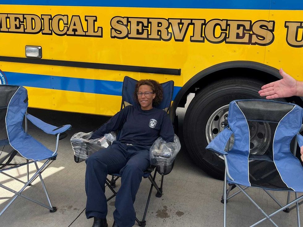 A member of Chesterfield Fire & EMS demonstrates a cooling chair