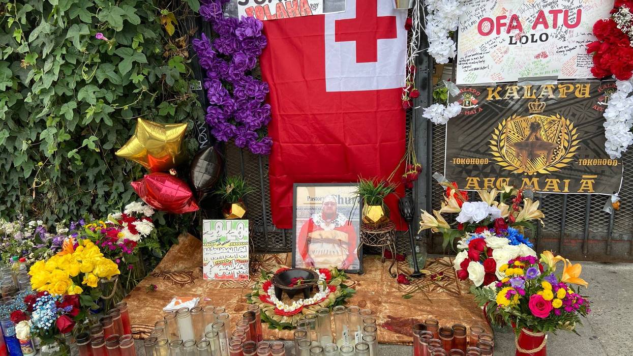 A memorial to Lolomanaia “Lolo” Soakai, 28, at the East Oakland intersection where he was killed in a high-speed crash early Sunday.