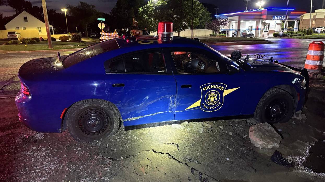A Michigan State Police vehicle is seen damaged after a crash.