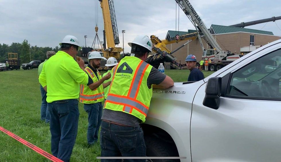 A mobile construction crane appears to have fallen into a middle school in the City of Wayne early Thursday afternoon.