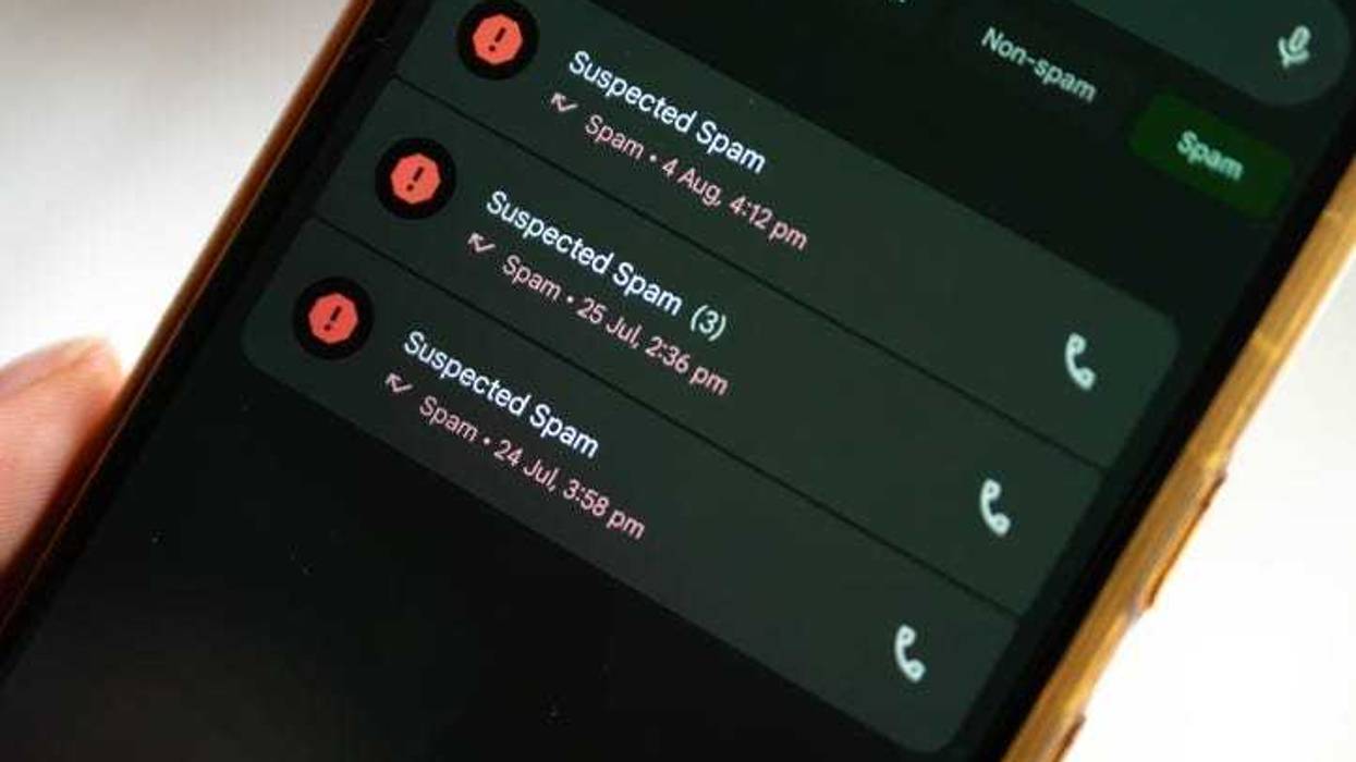 A mobile phone screen displays a list of past calls, all labeled as "Suspected Spam." The repetition of the warning icon and text shows the persistent nature of spam calls and the need for protective measures.