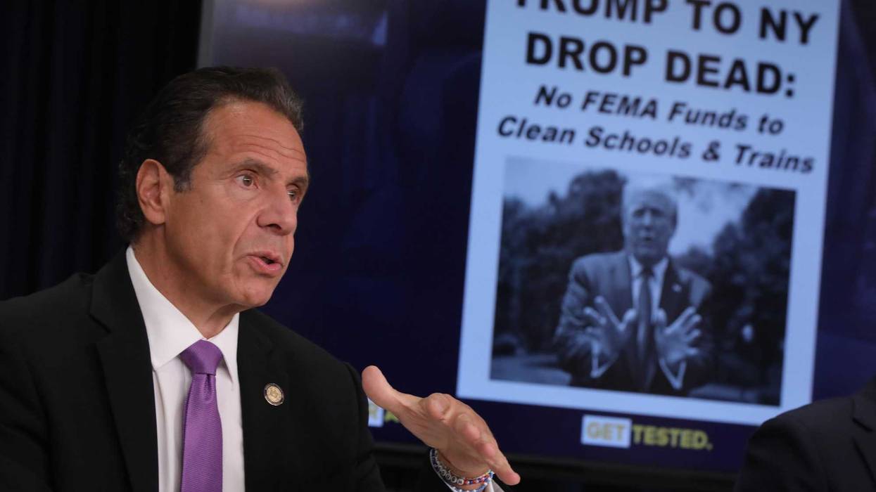 A mock up of a newspaper headline and photo of U.S. President Donald Trump is displayed on a screen as New York state Gov. Andrew Cuomo criticizes Trump's handling of COVID-19 at a news conference on September 08, 2020 in New York City. Cuomo, though easing restrictions on casinos and malls throughout the state, has declined to do so for indoor dining in restaurants in New York City despite pressure from business owners, citing struggles by the city to enforce the state's previous orders.