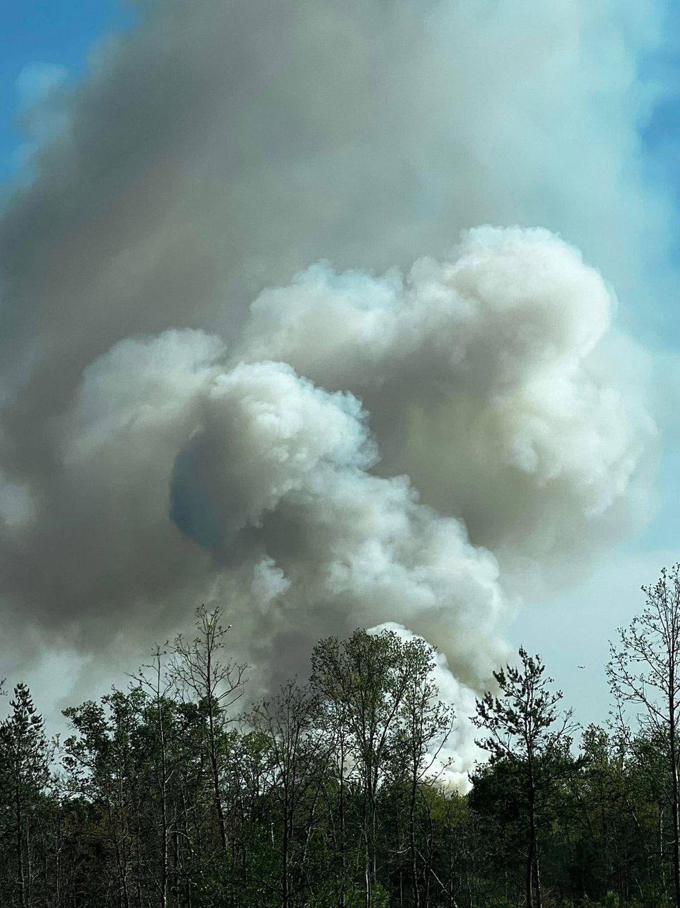 A modest campfire quickly spread into a full-scale wildfire on Friday, burning through 160 acres before crews got it under control in Northern Michigan.
