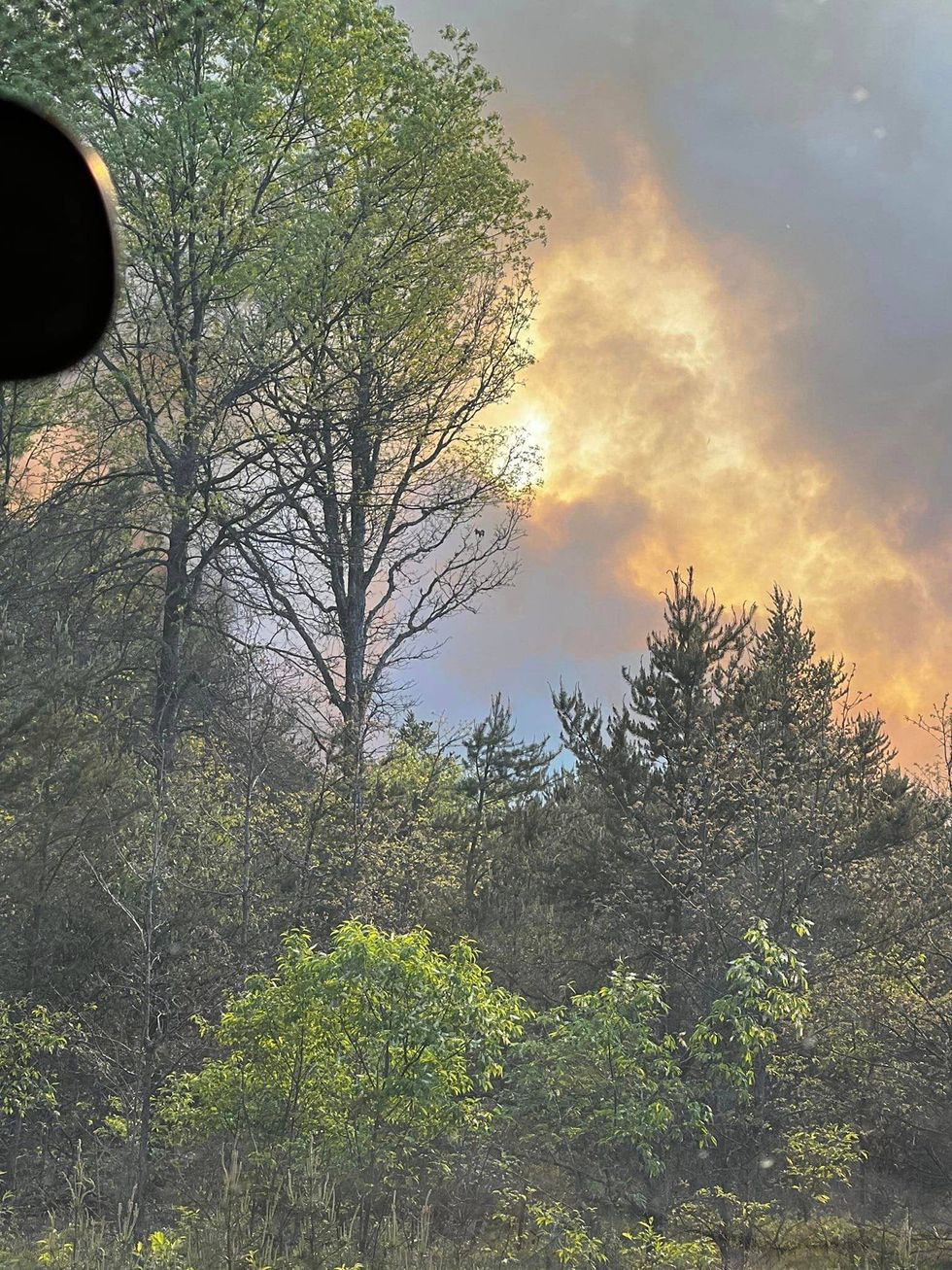 A modest campfire quickly spread into a full-scale wildfire on Friday, burning through 160 acres before crews got it under control in Northern Michigan.