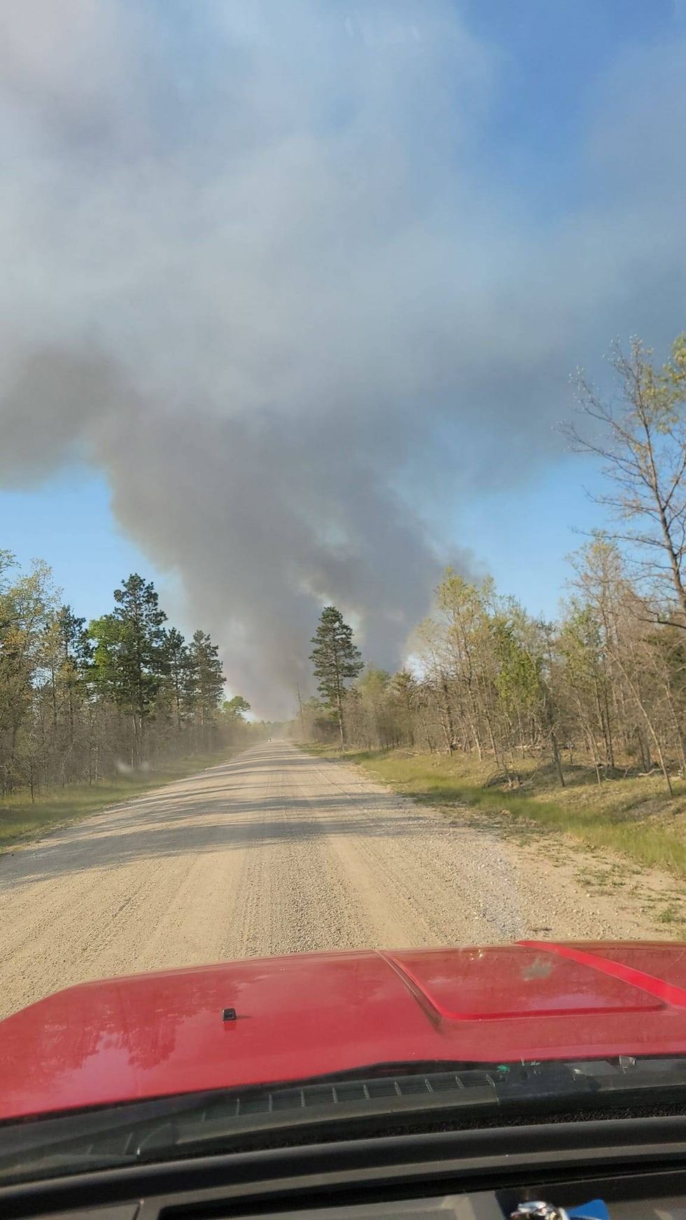 A modest campfire quickly spread into a full-scale wildfire on Friday, burning through 160 acres before crews got it under control in Northern Michigan.