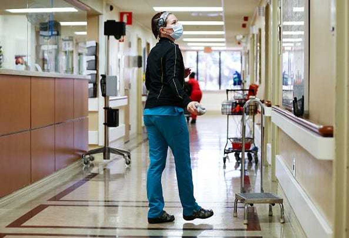 A monitor technician prepares to erase notes.