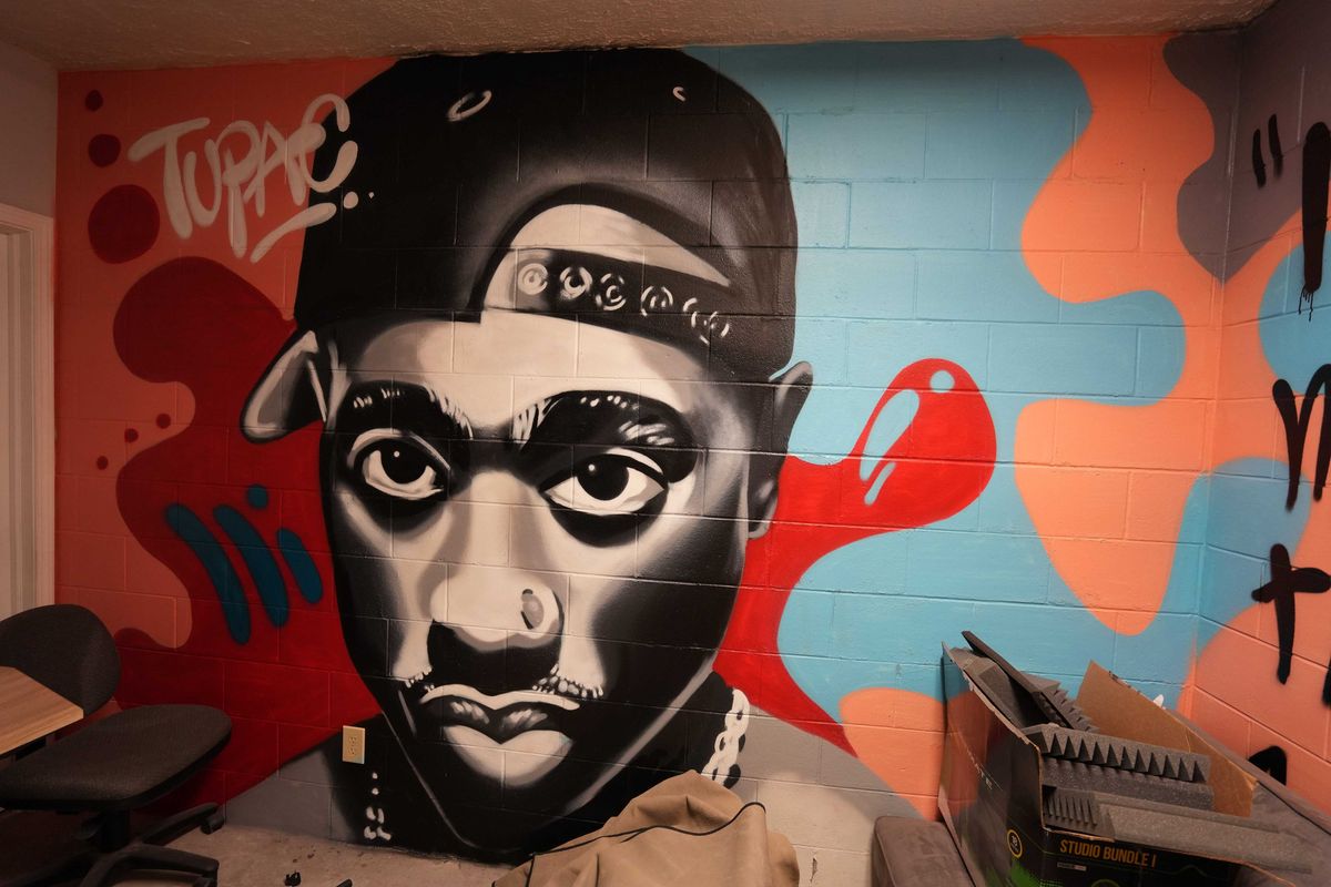 A mural of Tupac Shakur lines the wall in one of the VOICES rooms Wednesday, June 8, 2022, at VOICES in Indianapolis. The mural reflects a young black man whose message resonates with many of those at VOICES youth center. Blackfatherhoodonjuneteenth Mb 11