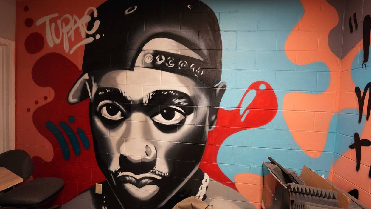 A mural of Tupac Shakur lines the wall in one of the VOICES rooms Wednesday, June 8, 2022, at VOICES in Indianapolis. The mural reflects a young black man whose message resonates with many of those at VOICES youth center. Blackfatherhoodonjuneteenth Mb 11