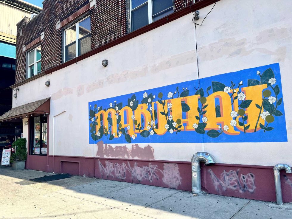 A mural reading "Mabuhay" Amazing Grace