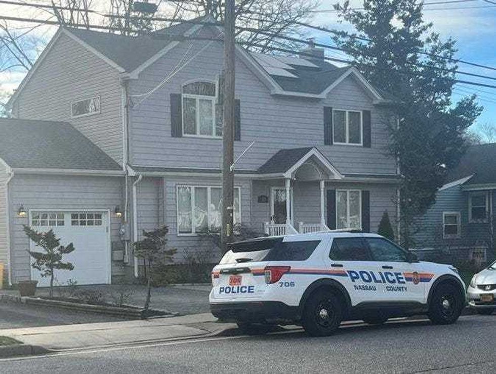 A Nassau County Police car is seen parked outside the home of fallen NYPD Officer Jonathan Diller on Tuesday