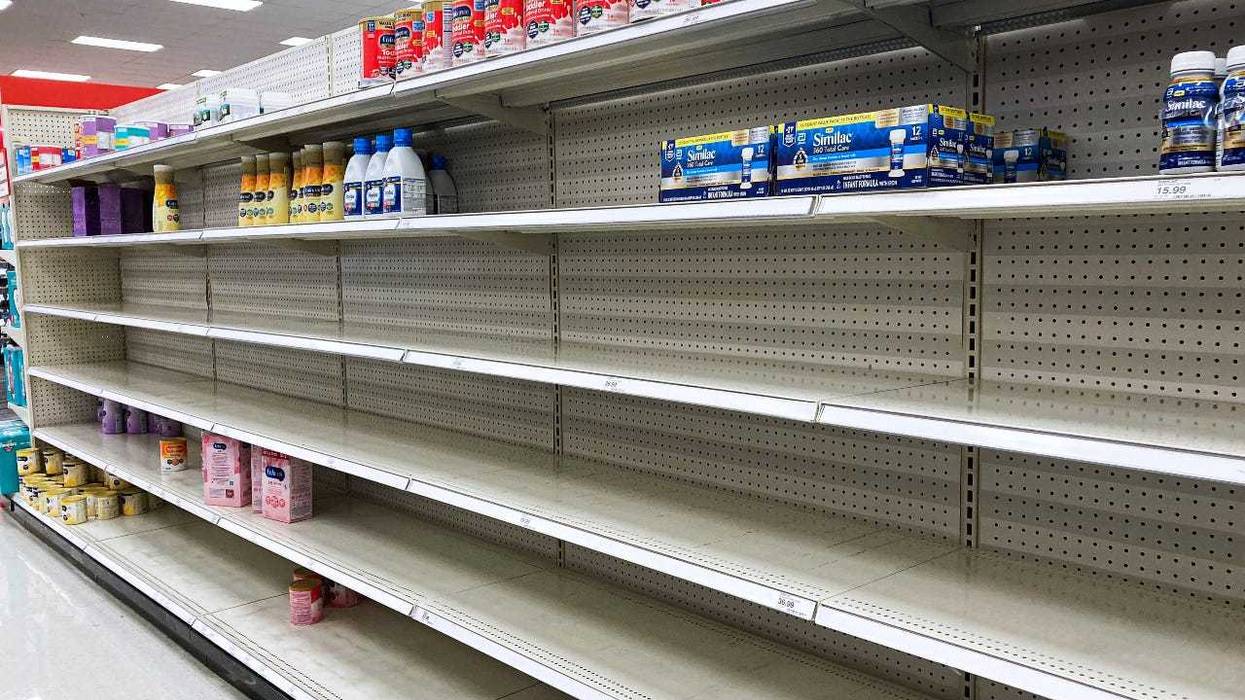 A nearly empty baby formula display shelf is seen at Target. Stores across the U.S. have been struggling to stock enough baby formula, causing some chains to limit customer purchases.